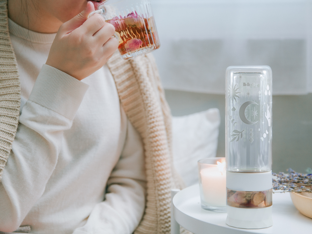 women drinking tea in cold weather  Edit alt text